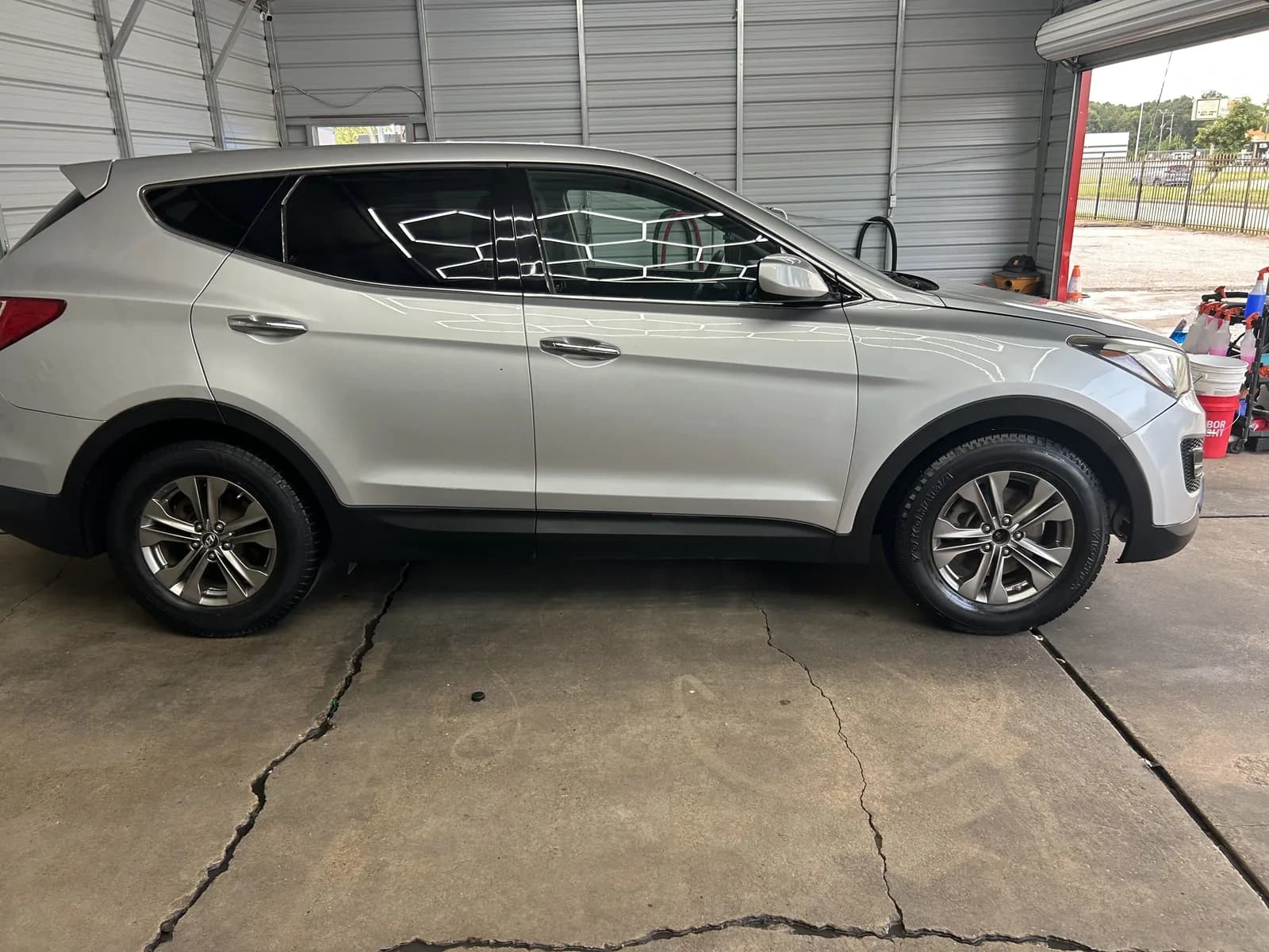 Silver Hyundai Santa Fe finished in the Faevaa detail bay